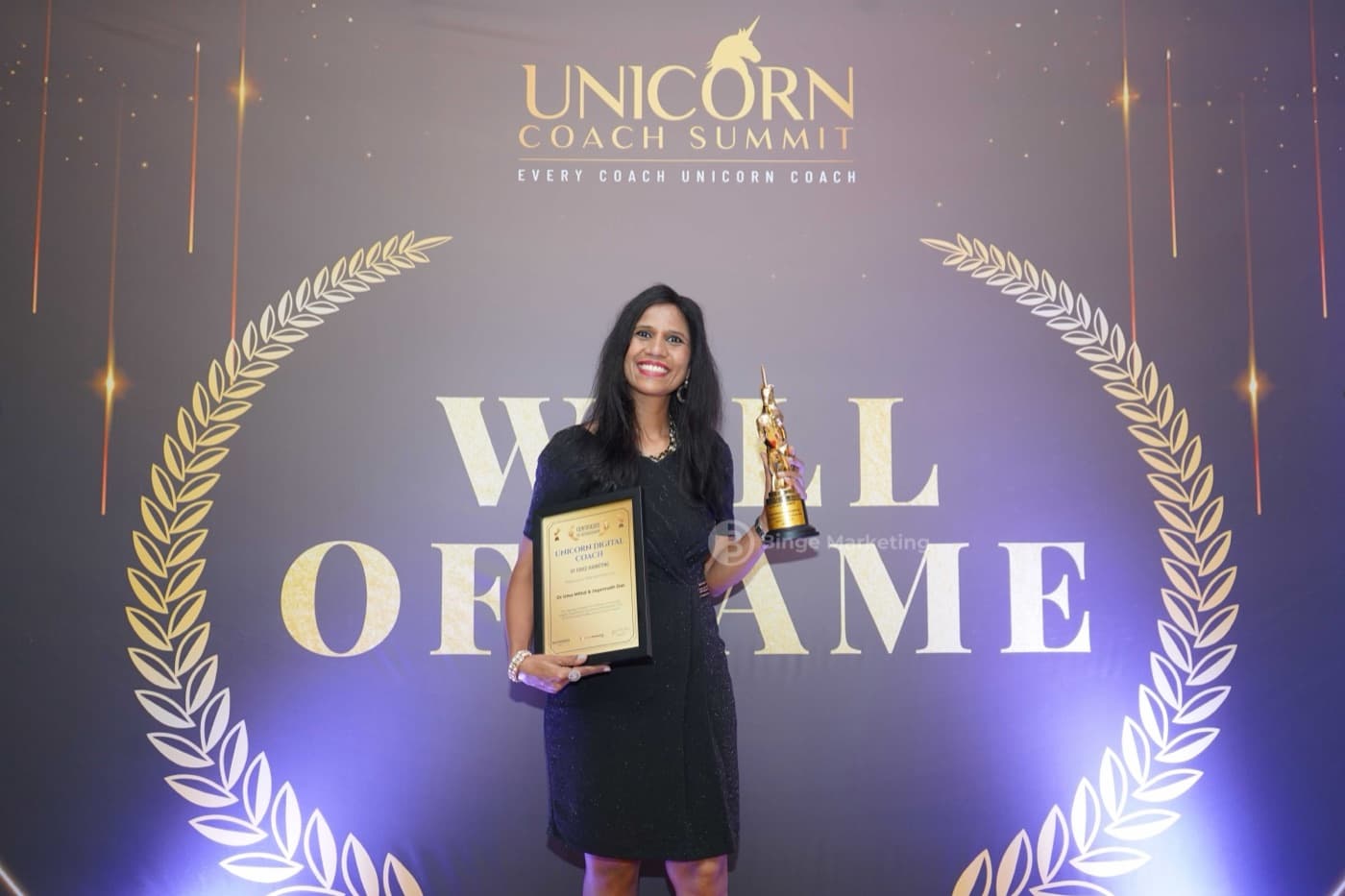 Dr. Uma at the Unicorn Coach Summit Wall of Fame